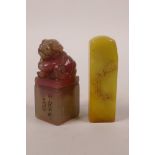 A Chinese soapstone seal with bamboo decoration and another stone seal with kylin knop, 2½" long