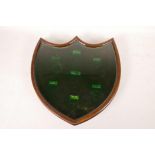 A small shield shaped inlaid mahogany display case, 13½" x 13½" x 1½" (vacant)