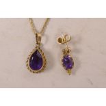 A 14ct gold amethsyst drop necklace and similar single earring