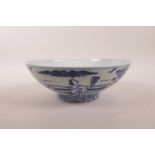 A Chinese blue and white porcelain bowl decorated with figures in a garden, 6 character mark to