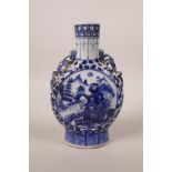 A Chinese blue and white porcelain pilgrim's flask with two dragon form handles, decorated with