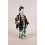 A Japanese porcelain figure in a black robe, A/F repair, 10" high