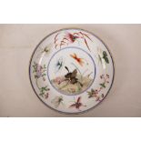 A Chinese polychrome porcelain cabinet plate with enamelled butterfly decoration, 6 character mark