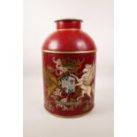 A toleware style tea canister with heraldic decoration, 9" diameter x 14½" high