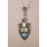 A 925 silver pendant necklace in the form of a peacock set with marcasite and opalite, 1½" drop