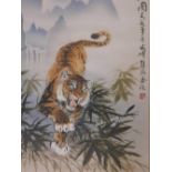 A Chinese hand finished print of a tiger, with inscription and seal mark, 18" x 29"