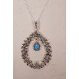 A 925 silver and marcasite set pendant necklace in the form of a wreath with a turquoise drop, 3"