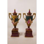 A pair of Royal Vienna style porcelain trophy urns, in the Empire style with allegorical scenes