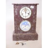 A French style marble double dial mantel clock, the upper dial with hours, the lower with day and