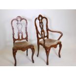 A set of eight (six and two) Dutch inlaid walnut chairs, with pierced splat backs on shaped supports