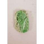 A Chinese carved green jade pendant with carp and ruyi decoration, 1½" long