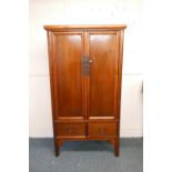 A C19th Chinese elm marriage cabinet, fitted with drawers, 41" x 23" x 73½"