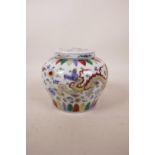 A Chinese doucai porcelain ginger jar decorated with dragons and flowers, character mark to base, 5"
