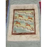 A Scandinavian mid century bespoke hand knotted wool rug decorated with a reindeer pattern, 56" x