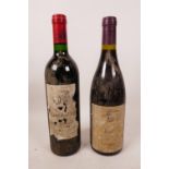 A bottle of Cote-Rotie red wine 1990, together with a bottle of Canon de B... red wine 1989