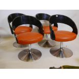 A set of five 1960s swivel tub chairs with bentwood frames and upholstered seats on chrome