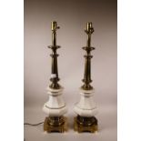 A pair of American porcelain and brass table lamps, 27" high