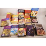 Fourteen volumes of Harry Potter books by J.K. Rowling