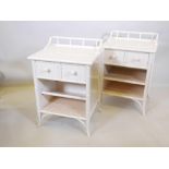 A pair of white faux bamboo bedside chests with turned back rails, two frieze drawers and open