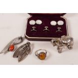 A miniature silver plated elephant trinket box, 1½" long, together with a silver and amber dress