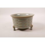 A Chinese duck egg blue crackle glazed porcelain censer on tripod supports, 5½" diameter