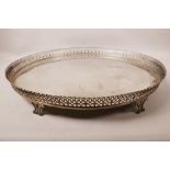 An antique Portuguese silver tray with pierced gallery and six supports, marked JRO and X1, and on