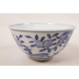 A Chinese blue and white porcelain rice bowl decorated with deer and peaches, 6 character mark to