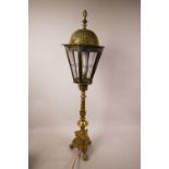 A brass table lamp in the form of a vintage street lamp, 25½" high
