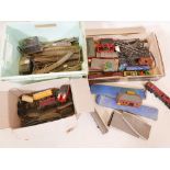 A collection of various OO gauge model railway rolling stock, building track, transformers etc