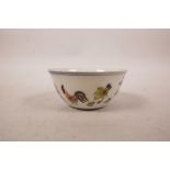 A Chinese doucai porcelain tea bowl with chicken decoration, 6 character mark to base, 3½" diameter