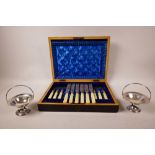 A canteen of six silver plated knives and six forks, with decorative engraving and bone handles,