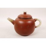 A Chinese redware teapot with jade handle, knop and spout, impressed seal mark to base, 4" diameter