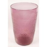 A large Whitefriars style mauve glass vase with bark pattern, 10" high