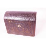 A Victorian tooled and embossed leather dome top jewellery casket (by Parsons), 6½" x 8½" x 4½"