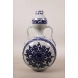 A Chinese blue and white porcelain two handled flask decorated with a Yin Yang design, 6 character