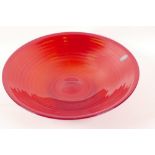 A Whitefriars red glass shallow bowl of ribbed design, 12½" diameter