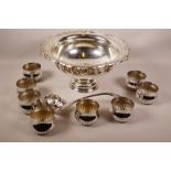 A silver plated pedestal punch bowl with eight cups and ladle, 13" diameter