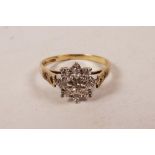 A 9ct yellow gold diamond cluster ring, approximate size 'N/O'