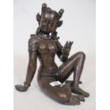 A cold cast bronzed figure of an Indian goddess, A/F minor loss to headdress, 12" high