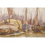 John F. Rennie (f.l. 1900-1930), fishing boats at rest, signed and dated lower left 1911,