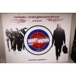 A mounted film poster 'Harry Brown', signed by Michael Caine, 40" x 30"