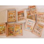 A collection of childrens' comics from the 1950s and 1960s, including The Victor, Bunty, The Rover
