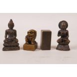 Two Sino-Tibetan miniature bronze Buddhas, together with two Chinese miniature bronze seals, largest