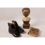 A pair of C19th child's leather boots, 5¼" long, together with a small cloth bound 'Humpty Dumpty