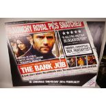 A mounted film poster 'The Bank Job', signed by cast members, 40" x 30"