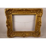 A C19th gilt plaster picture frame, aperture 16½" x 12½"