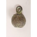 An antique bronze weight with verdigris patina, 2"