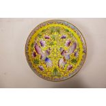 A Chinese porcelain cabinet plate with enamelled hummingbird decoration, 6 character mark to base,