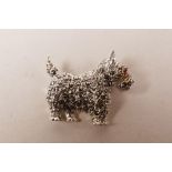 A sterling silver and marcasite set brooch in the form of a Scottie dog, 1"