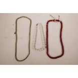Three strings of hardstone and agate beads, longest 26"